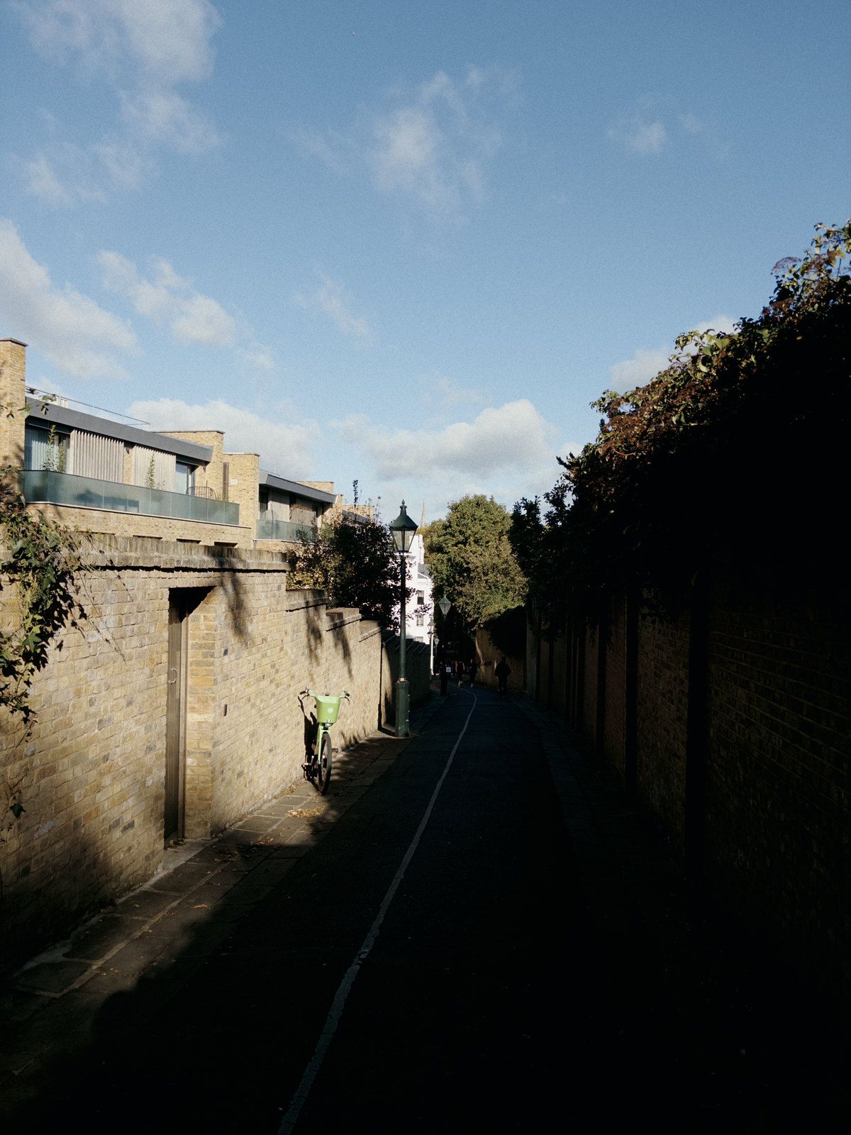A lane in low sun, taken with sunday: softer, deeper and grainy.